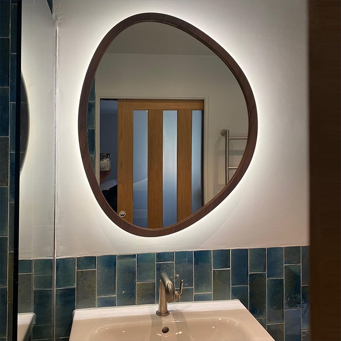 On-trend organically shaped pebble mirrors.