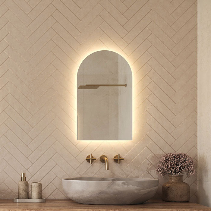 What is an IP44-rated illuminated bathroom mirror, and why does it matter?