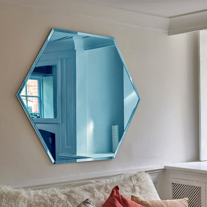 Bold blue wall mirror with a hand-finished bevelled edge
