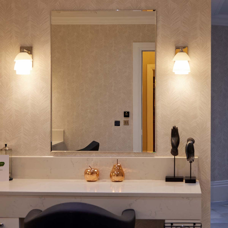 Large, bevelled mirrors take pride of place in the Fairmont Beauty Salon