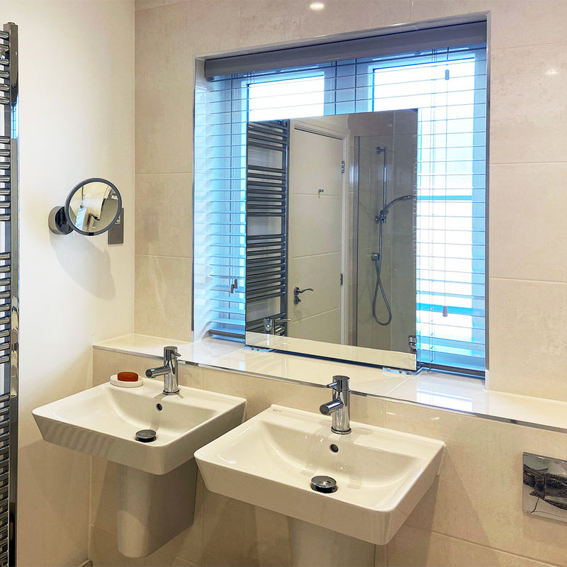 Tabletop bathroom mirror with clear acrylic stands