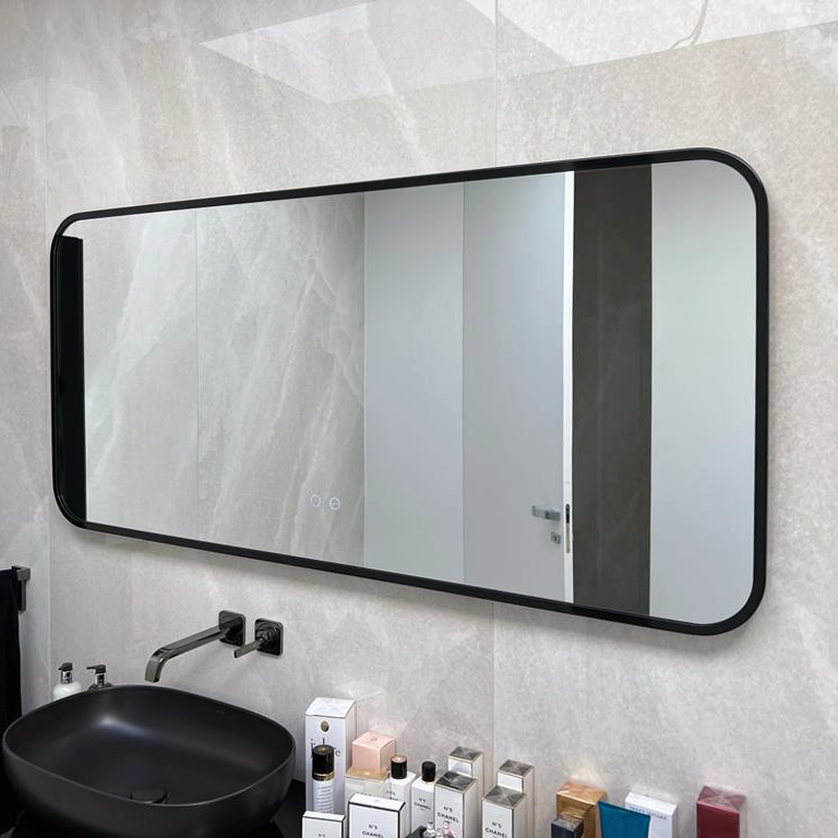 Black framed backlit mirror with radius corners, perfect for this double vanity