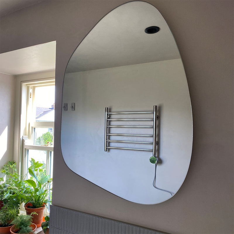 Whether illuminated or not, our pebble mirrors add an instant focal point