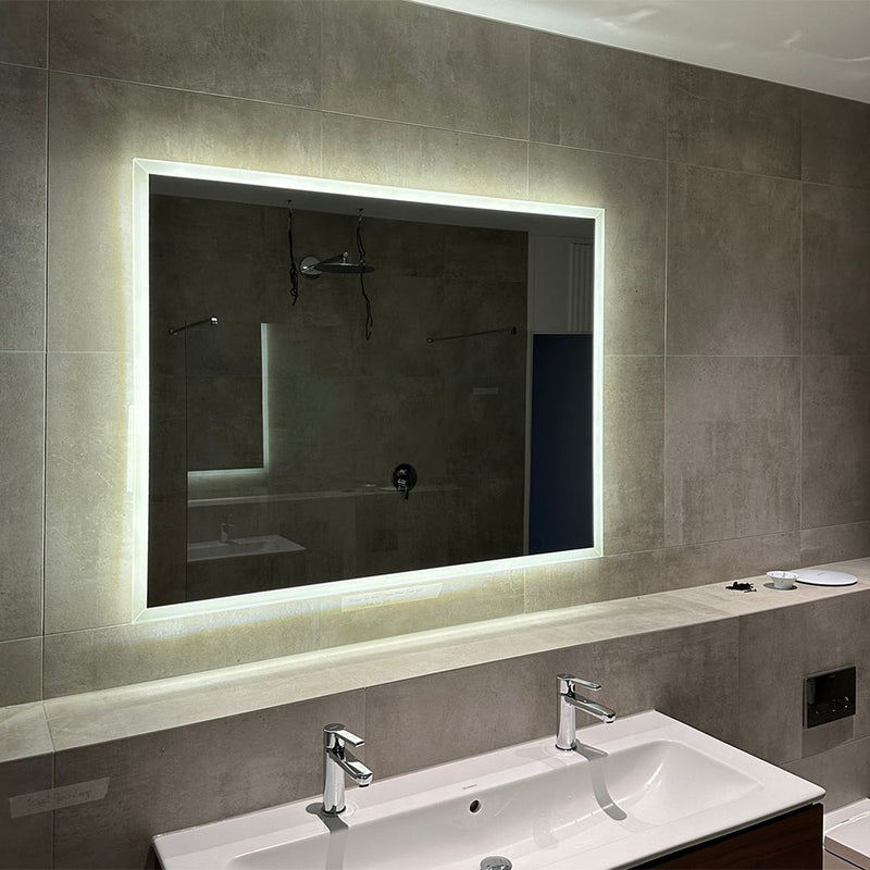 An acrylic edge-lit bathroom mirror gives you an abundance of ambient lighting