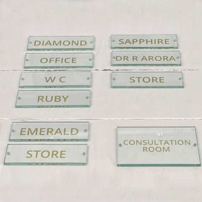 Hand-painted gold signs on 10mm glass for the Fairmont Hotel, Windsor