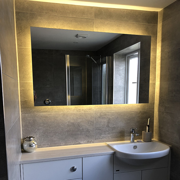 1200mm W x 700mm H Backlit Mirror with 3000k Warm LEDS.