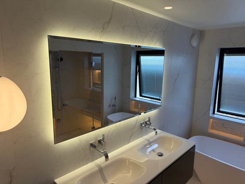1300mm wide x 700mm high bevelled backlit mirror