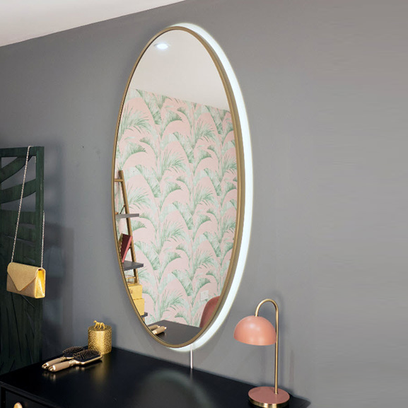 Oval 1300mm x 700mm with a brushed gold metal frame and ambient backlighting